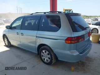 2003 Honda Odyssey EX with VIN 5FNRL18623B137962, listed as a IAAI auction lot 42155182 with 117,034 mi miles and . Bid and sale history available at DreamBid. Image 3.