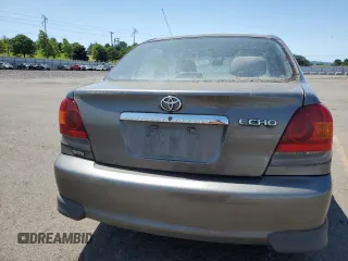 2004 Toyota ECHO with VIN JTDBT123140331964, listed as a Copart auction lot 59156135 with 180,834 mi miles and Salvage title. Bid and sale history available at DreamBid. Image 6.