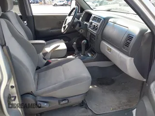 2003 Mitsubishi Montero Sport XLS with VIN JA4MT31R03J023679, listed as a IAAI auction lot 41872682 with 148,365 mi miles. Bid and sale history available at carsss.com. Image 5.