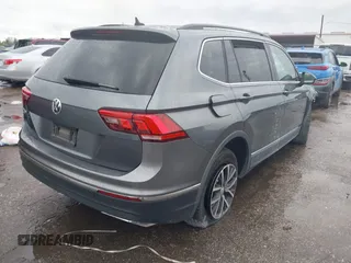 2020 Volkswagen Tiguan SE with VIN 3VV3B7AX0LM121061, listed as a IAAI auction lot 41881541 with 60,315 mi miles and . Bid and sale history available at DreamBid. Image 4.