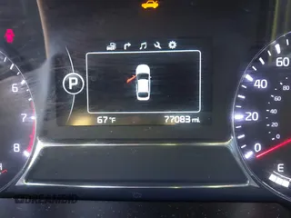 2015 Kia Optima SX Turbo with VIN 5XXGR4A66FG382167, listed as a IAAI auction lot 40951399 with 77,083 mi miles and . Bid and sale history available at DreamBid. Image 15.