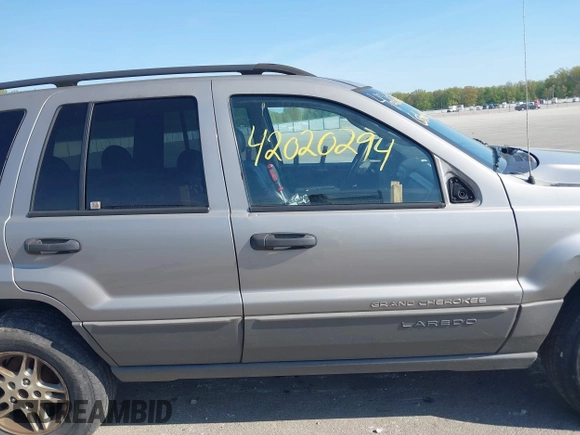 2002 Jeep Grand Cherokee with VIN 1J8GW48N72C207838, listed as a IAAI auction lot 42020294 with 181,283 mi miles and . Bid and sale history available at DreamBid. Image 14.