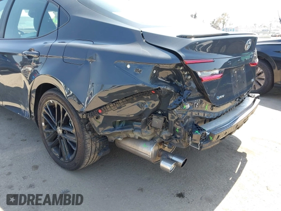 2025 Toyota Camry LE z VIN 4T1DAACK7SU531768, wystawiony jako IAAI lot #42187559 z przebiegiem 26 348 mil mil oraz . Historia ofert i sprzedaży dostępna na DreamBid. Obrazek 6.