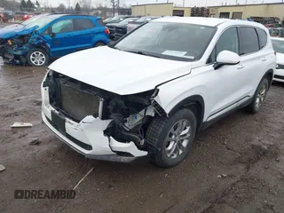 2020 Hyundai Santa Fe SEL with VIN 5NMS3CAD6LH275475, listed as a IAAI auction lot 41151122 with 136,071 mi miles. Bid and sale history available at carsss.com. Image 2.
