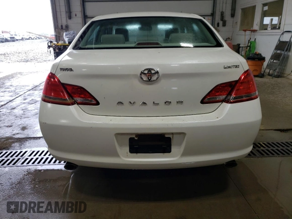 2006 Toyota Avalon XL z VIN 4T1BK36B86U150304, wystawiony jako Copart lot #57402735 z przebiegiem 244 634 mil mil oraz Czysty tytuł • Clean title. Historia ofert i sprzedaży dostępna na DreamBid. Obrazek 6.