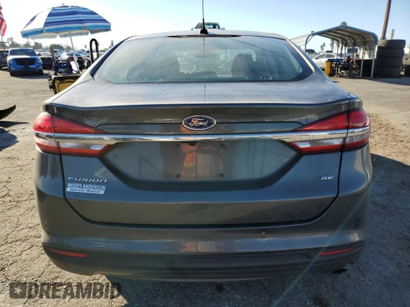 2017 Ford Fusion SE с VIN 3FA6P0H70HR268927, выставлен на аукционе Copart как лот 82872364 с пробегом 60 286 миль миль и Списание • Salvage title. История ставок и продаж доступна на DreamBid. Изображение 6.