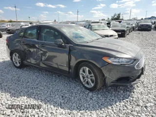 2018 Ford Fusion Hybrid S with VIN 3FA6P0UU8JR145166, listed as a Copart auction lot 71016294 with 54,817 mi miles and Salvage Title. Bid and sale history available at carsss.com. Image 4.