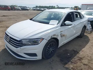 2021 Volkswagen Jetta S z VIN 3VWC57BU0MM021874, wystawiony jako IAAI lot #42124747 z przebiegiem 89 887 mil mil oraz . Historia ofert i sprzedaży dostępna na DreamBid. Obrazek 2.