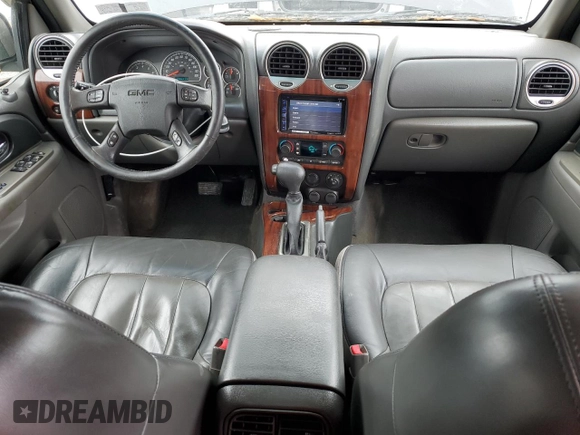 2004 GMC Envoy SLT with VIN 1GKDT13S842210243, listed as a Copart auction lot 55672595 with 148,232 mi miles and Clean Title. Bid and sale history available at DreamBid. Image 8.