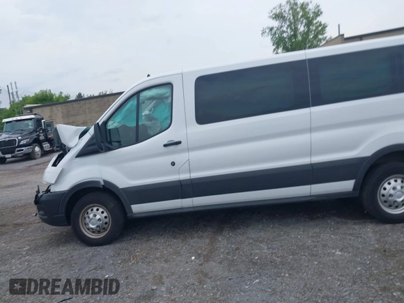 2023 Ford Transit Passenger XL with VIN 1FBAX9Y83PKC08567, listed as a IAAI auction lot 39883261 with 15,028 mi miles and . Bid and sale history available at DreamBid. Image 14.