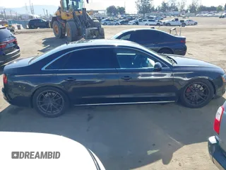 2011 Audi A8 with VIN WAURVAFD9BN014362, listed as a IAAI auction lot 41960366 with 135,244 mi miles and . Bid and sale history available at DreamBid. Image 13.