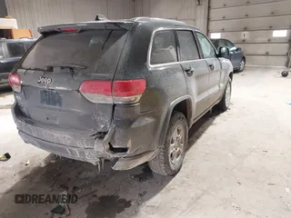 2017 Jeep Grand Cherokee Laredo with VIN 1C4RJFAG6HC661836, listed as a IAAI auction lot 41622814 with 134,509 mi miles. Bid and sale history available at carsss.com. Image 4.