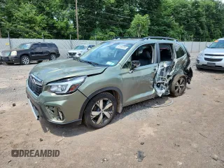 2020 Subaru Forester Touring with VIN JF2SKAXC4LH482519, listed as a Copart auction lot 62868255 with 71,009 mi miles and Salvage title. Bid and sale history available at DreamBid. Image 1.