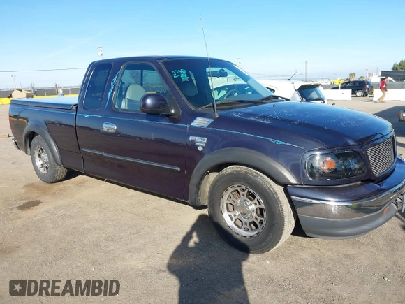 1999 Ford F-150 XL with VIN 1FTRX17L4XKA58054, listed as a IAAI auction lot 41647530 with 225,632 mi miles. Bid and sale history available at carsss.com. Image 1.