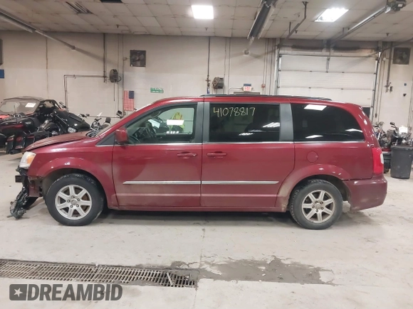 2012 Chrysler Town & Country Touring with VIN 2C4RC1BG1CR314023, listed as a IAAI auction lot 41078817 with Not Provided miles and . Bid and sale history available at DreamBid. Image 14.