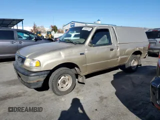 1999 Mazda B-Series 2WD Truck SX with VIN 4F4YR12C1XTM39102, listed as a Copart auction lot 83462634 with 241,380 mi miles and Salvage Title. Bid and sale history available at carsss.com. Image 1.