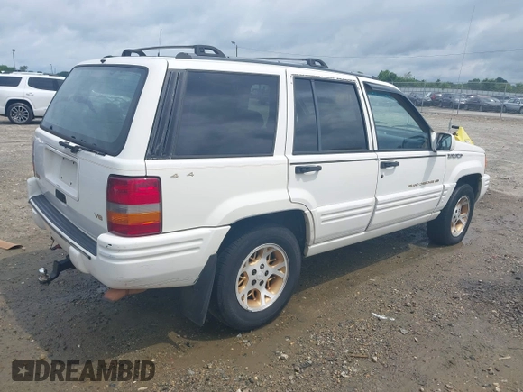 1996 Jeep Grand Cherokee Limited z VIN 1J4GZ78YXTC191527, wystawiony jako IAAI lot #42352616 z przebiegiem 325 927 mil mil oraz . Historia ofert i sprzedaży dostępna na DreamBid. Obrazek 4.