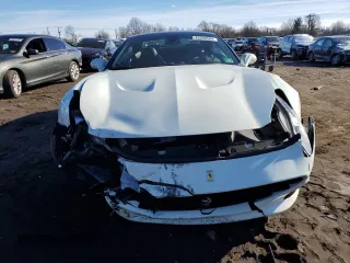 2016 Ferrari California T z VIN ZFF77XJA2G0213103, wystawiony jako Copart lot #43268564 z przebiegiem 12 200 mil mil oraz Szkody całkowita. Historia ofert i sprzedaży dostępna na DreamBid. Obrazek 5.
