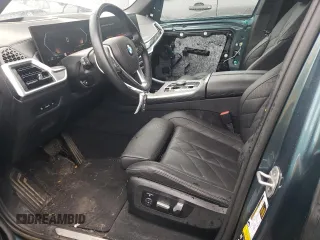 2024 BMW X5 xDrive40i with VIN 5UX23EU02R9T63818, listed as a Copart auction lot 60195525 with 26,773 mi miles and Salvage title. Bid and sale history available at DreamBid. Image 7.