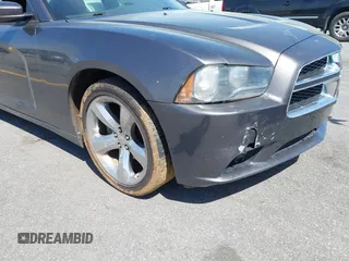 2014 Dodge Charger SE with VIN 2C3CDXBG0EH216023, listed as a IAAI auction lot 41827307 with 243,107 mi miles. Bid and sale history available at carsss.com. Image 18.