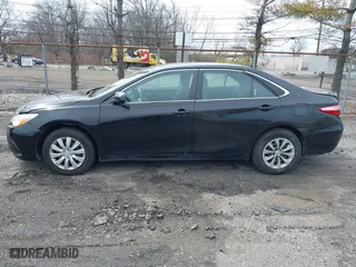 2015 Toyota Camry Hybrid LE with VIN 4T1BD1FK3FU164092, listed as a IAAI auction lot 41886726 with 396,189 mi miles. Bid and sale history available at carsss.com. Image 14.
