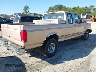 1996 Ford F-150 Special with VIN 1FTEX15N1TKA31567, listed as a IAAI auction lot 41762657 with 305,222 mi miles. Bid and sale history available at carsss.com. Image 4.