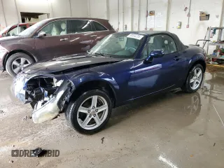 2007 Mazda MX-5 Miata Sport z VIN JM1NC25F570124264, wystawiony jako Copart lot #59690285 z przebiegiem 278 173 mil mil oraz Szkoda całkowita • Salvage title. Historia ofert i sprzedaży dostępna na DreamBid. Obrazek 1.