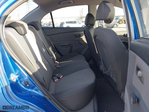2009 Kia Rio with VIN KNADE223296502151, listed as a IAAI auction lot 41602918 with 143,996 mi miles. Bid and sale history available at carsss.com. Image 8.