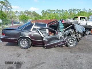 1994 Ford Crown Victoria LX с VIN 2FALP74W1RX133239, выставлен на аукционе IAAI как лот 42020257 с пробегом 110 463 миль миль и . История ставок и продаж доступна на DreamBid. Изображение 13.