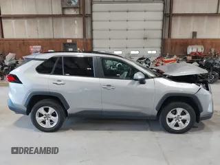 2021 Toyota RAV4 XLE with VIN 2T3P1RFV5MC180890, listed as a IAAI auction lot 42567858 with 56,961 mi miles and . Bid and sale history available at DreamBid. Image 12.