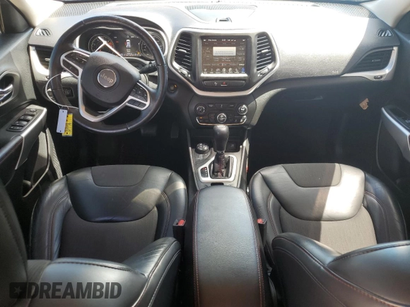 2018 Jeep Cherokee Trailhawk with VIN 1C4PJMBB4JD526014, listed as a Copart auction lot 58728255 with 76,655 mi miles and Salvage title. Bid and sale history available at DreamBid. Image 8.