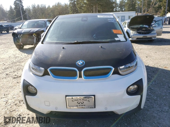 2014 BMW i3 z VIN WBY1Z4C56EV277091, wystawiony jako Copart lot #47089255 z przebiegiem 106 809 mil mil oraz Czysty tytuł • Clean title. Historia ofert i sprzedaży dostępna na DreamBid. Obrazek 5.