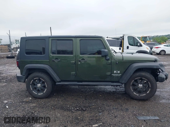 2007 Jeep Wrangler Unlimited X with VIN 1J4GA39127L231378, listed as a IAAI auction lot 42252475 with 152,568 mi miles and . Bid and sale history available at DreamBid. Image 14.