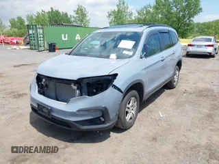 2022 Honda Pilot Special Edition with VIN 5FNYF6H27NB104990, listed as a IAAI auction lot 42219770 with 23,200 mi miles and . Bid and sale history available at DreamBid. Image 21.