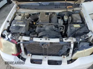 2002 GMC Envoy SLT with VIN 1GKDS13S822460095, listed as a Copart auction lot 77004764 with 267,716 mi miles and Salvage Title. Bid and sale history available at carsss.com. Image 12.
