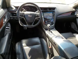 2015 Cadillac CTS Luxury AWD z VIN 1G6AX5SX3F0114674, wystawiony jako Copart lot #53913865 z przebiegiem 103 959 mil mil oraz Szkoda całkowita • Salvage title. Historia ofert i sprzedaży dostępna na DreamBid. Obrazek 8.