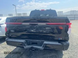2022 Ford F-150 Lightning Pro z VIN 1FT6W1EV8NWG04113, wystawiony jako Copart lot #51413924 z przebiegiem Nie podano mil oraz Szkoda całkowita • Salvage title. Historia ofert i sprzedaży dostępna na DreamBid. Obrazek 6.