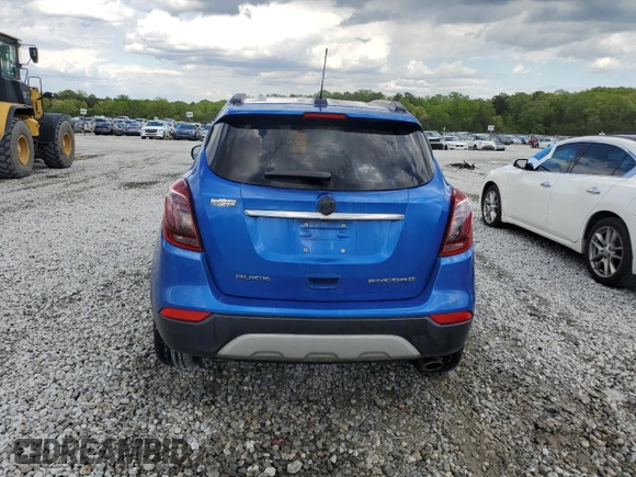 2017 Buick Encore Essence with VIN KL4CJCSB4HB058035, listed as a Copart auction lot 52089365 with 64,194 mi miles and Salvage Title. Bid and sale history available at carsss.com. Image 6.