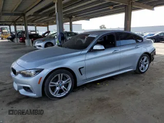 2019 BMW 4 Series 430i with VIN WBA4J1C52KBM18513, listed as a Copart auction lot 50002515 with 106,899 mi miles and Salvage Title. Bid and sale history available at carsss.com. Image 1.