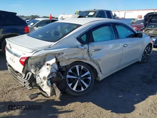 2016 Nissan Altima S z VIN 1N4AL3APXGC130780, wystawiony jako IAAI lot #41461581 z przebiegiem 92 043 mil mil oraz . Historia ofert i sprzedaży dostępna na DreamBid. Obrazek 4.