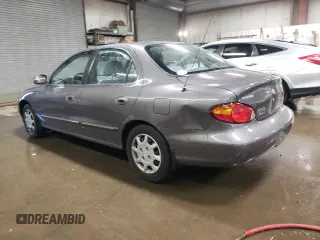 2000 Hyundai Elantra GLS z VIN KMHJF35F1YU995390, wystawiony jako Copart lot #78523024 z przebiegiem 130 349 mil mil oraz Szkoda całkowita • Salvage title. Historia ofert i sprzedaży dostępna na DreamBid. Obrazek 2.