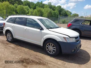 2015 Dodge Journey SXT z VIN 3C4PDCBG4FT727300, wystawiony jako IAAI lot #42646122 z przebiegiem 201 362 mil mil oraz . Historia ofert i sprzedaży dostępna na DreamBid. Obrazek 1.