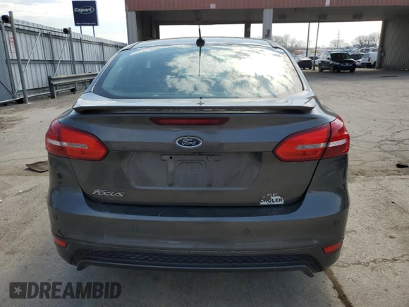 2015 Ford Focus SE z VIN 1FADP3F29FL340350, wystawiony jako Copart lot #53466455 z przebiegiem 146 374 mil mil oraz Szkoda całkowita • Salvage title. Historia ofert i sprzedaży dostępna na DreamBid. Obrazek 6.