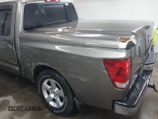 2006 Nissan Titan LE z VIN 1N6BA07B26N572273, wystawiony jako IAAI lot #41252390 z przebiegiem 88 457 mil mil oraz . Historia ofert i sprzedaży dostępna na DreamBid. Obrazek 18.