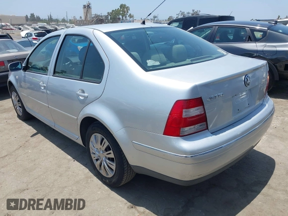 2004 Volkswagen Jetta GL z VIN 3VWRA69M34M031594, wystawiony jako IAAI lot #42565161 z przebiegiem 191 011 mil mil oraz . Historia ofert i sprzedaży dostępna na DreamBid. Obrazek 3.