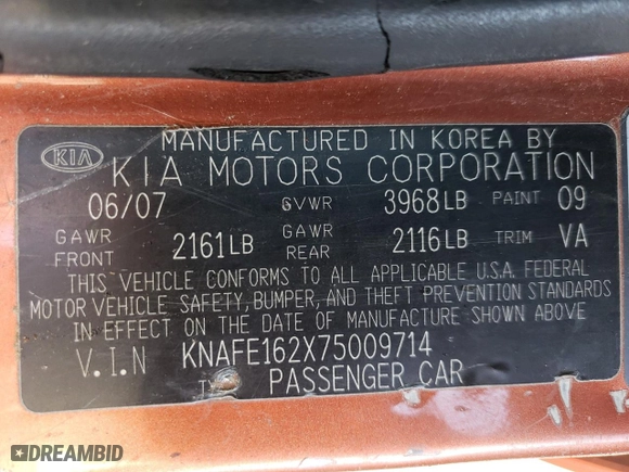 2007 Kia Spectra with VIN KNAFE162X75009714, listed as a Copart auction lot 69094894 with 206,173 mi miles and Salvage Title. Bid and sale history available at carsss.com. Image 12.