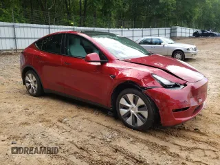 2024 Tesla Model Y Long Range with VIN 7SAYGDEE2RA269884, listed as a Copart auction lot 56937585 with 49,374 mi miles and Salvage title. Bid and sale history available at DreamBid. Image 4.