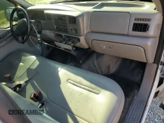 2000 Ford Super Duty F-250 XL with VIN 1FTNF20F9YEC91357, listed as a Copart auction lot 76673234 with 318,306 mi miles and Salvage Title. Bid and sale history available at carsss.com. Image 8.