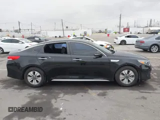2017 Kia Optima Hybrid with VIN KNAGT4LC8H5008457, listed as a IAAI auction lot 41890144 with 122,340 mi miles. Bid and sale history available at carsss.com. Image 14.