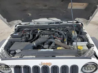 2010 Jeep Wrangler Unlimited Rubicon with VIN 1J4BA6H10AL176014, listed as a Copart auction lot 57092255 with 138,253 mi miles and Salvage title. Bid and sale history available at DreamBid. Image 12.